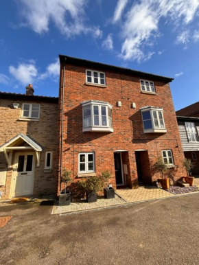 Stylish 3 bedroom townhouse for 5 guests, set in the medieval grid with off street parking